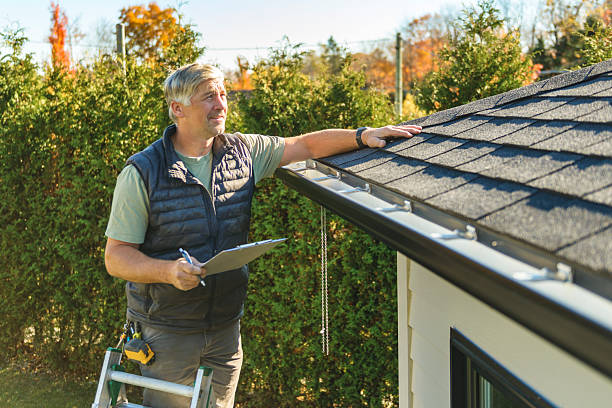 Professional Hail Damage Roof Repair technician working in Oak Ridge, FL